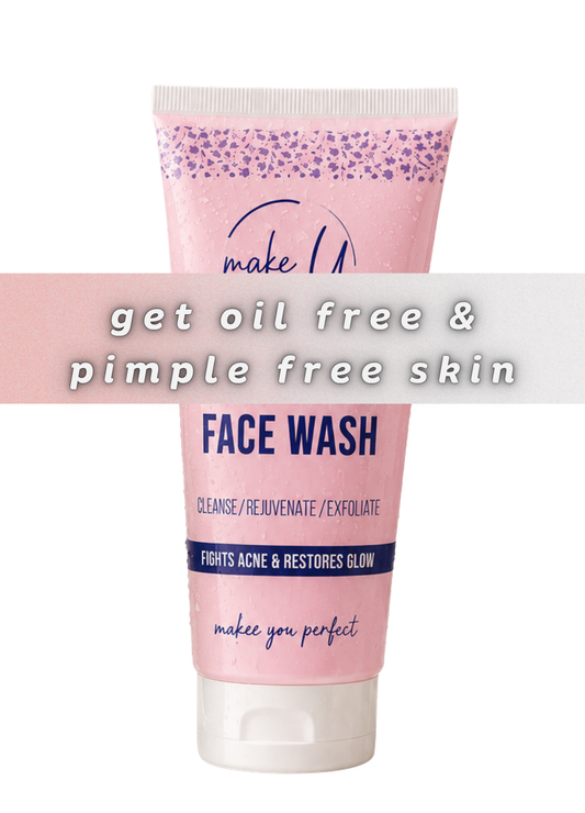 Pink face wash tube with text on a white background